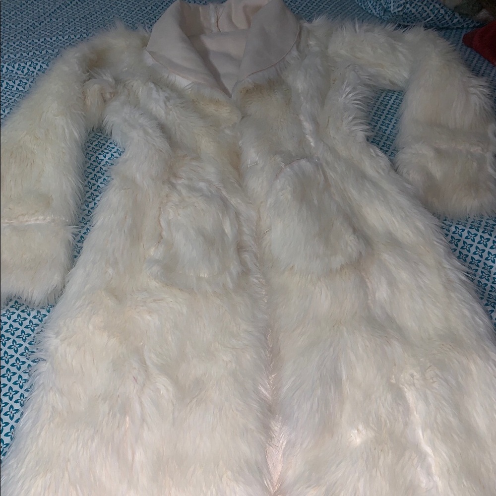 White fur stylish coat